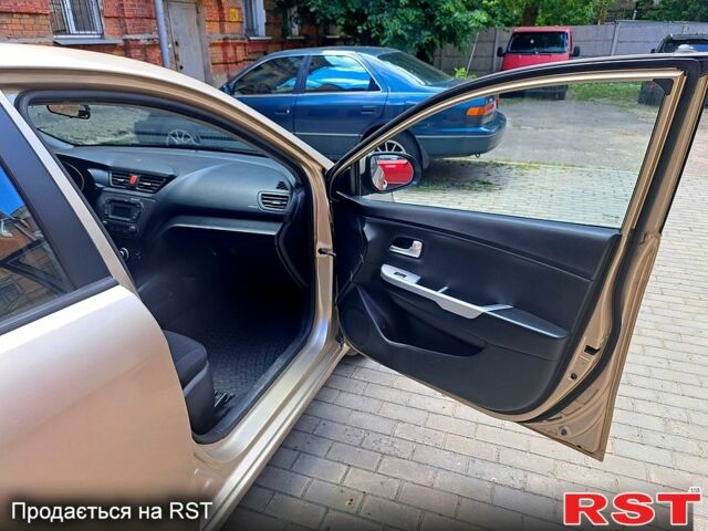 Бежевый Киа Рио, объемом двигателя 1.4 л и пробегом 145 тыс. км за 7500 $, фото 9 на Automoto.ua