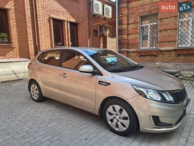 Бежевий Кіа Ріо, об'ємом двигуна 1.4 л та пробігом 145 тис. км за 6500 $, фото 1 на Automoto.ua