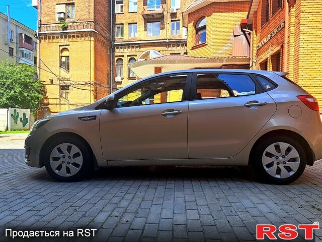 Бежевый Киа Рио, объемом двигателя 1.4 л и пробегом 145 тыс. км за 7500 $, фото 1 на Automoto.ua