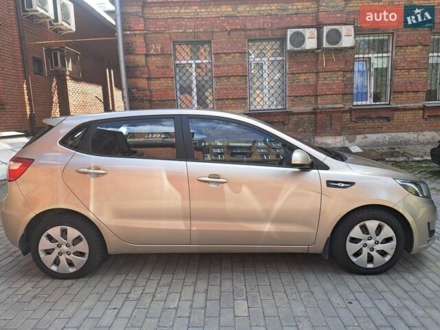Бежевий Кіа Ріо, об'ємом двигуна 1.4 л та пробігом 145 тис. км за 6500 $, фото 3 на Automoto.ua