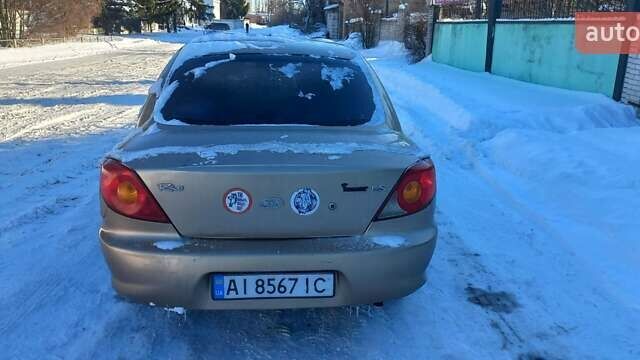 Бежевый Киа Рио, объемом двигателя 1.34 л и пробегом 293 тыс. км за 1900 $, фото 4 на Automoto.ua