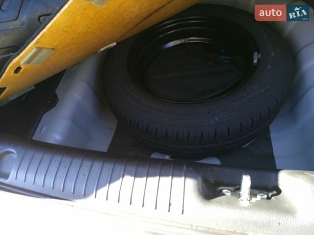 Бежевий Кіа Ріо, об'ємом двигуна 1.4 л та пробігом 85 тис. км за 6900 $, фото 15 на Automoto.ua