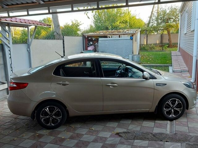 Бежевий Кіа Ріо, об'ємом двигуна 1.6 л та пробігом 52 тис. км за 8500 $, фото 2 на Automoto.ua