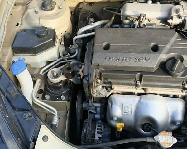 Бежевий Кіа Ріо, об'ємом двигуна 1.4 л та пробігом 42 тис. км за 7094 $, фото 3 на Automoto.ua