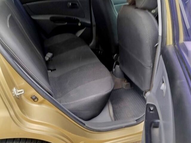 Бежевий Кіа Ріо, об'ємом двигуна 1.4 л та пробігом 182 тис. км за 3800 $, фото 6 на Automoto.ua