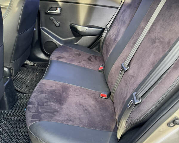 Бежевый Киа Рио, объемом двигателя 1.4 л и пробегом 147 тыс. км за 8500 $, фото 8 на Automoto.ua