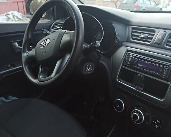 Бежевий Кіа Ріо, об'ємом двигуна 1.4 л та пробігом 128 тис. км за 6600 $, фото 8 на Automoto.ua