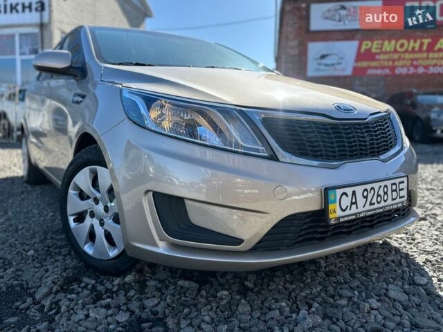 Бежевий Кіа Ріо, об'ємом двигуна 1.4 л та пробігом 66 тис. км за 7500 $, фото 18 на Automoto.ua