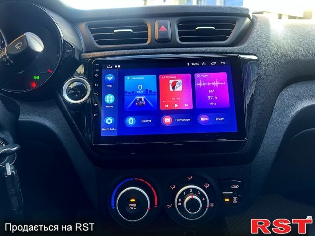 Бежевий Кіа Ріо, об'ємом двигуна 1.4 л та пробігом 18700 тис. км за 5600 $, фото 9 на Automoto.ua