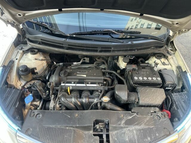 Бежевий Кіа Ріо, об'ємом двигуна 1.4 л та пробігом 187 тис. км за 5600 $, фото 11 на Automoto.ua