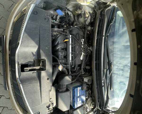 Бежевый Киа Рио, объемом двигателя 1.59 л и пробегом 198 тыс. км за 7300 $, фото 13 на Automoto.ua