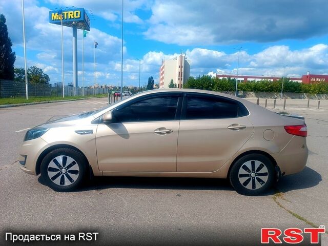 Бежевый Киа Рио, объемом двигателя 1.4 л и пробегом 211 тыс. км за 8200 $, фото 1 на Automoto.ua