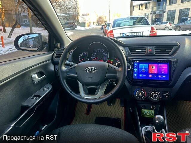 Бежевий Кіа Ріо, об'ємом двигуна 1.4 л та пробігом 18700 тис. км за 5600 $, фото 10 на Automoto.ua