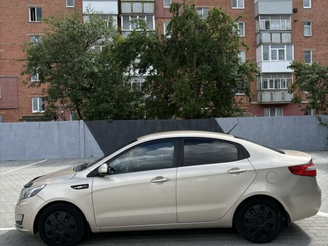Бежевый Киа Рио, объемом двигателя 1.4 л и пробегом 125 тыс. км за 7456 $, фото 5 на Automoto.ua