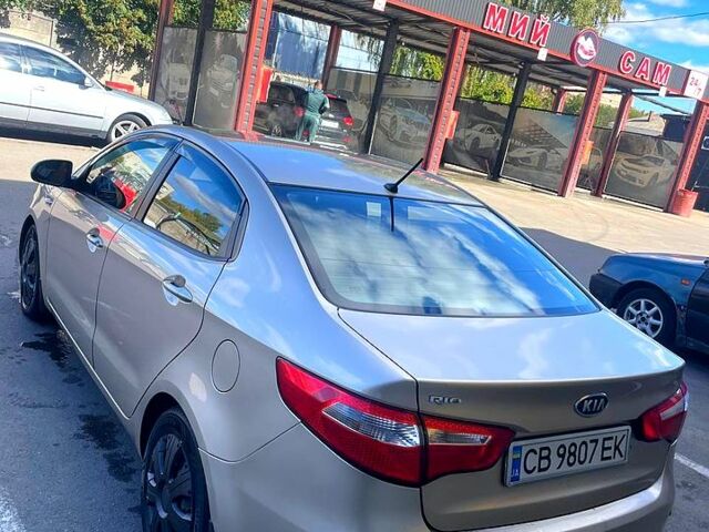 Бежевий Кіа Ріо, об'ємом двигуна 1.4 л та пробігом 126 тис. км за 7300 $, фото 5 на Automoto.ua