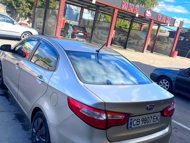 Бежевий Кіа Ріо, об'ємом двигуна 1.4 л та пробігом 126 тис. км за 7300 $, фото 6 на Automoto.ua