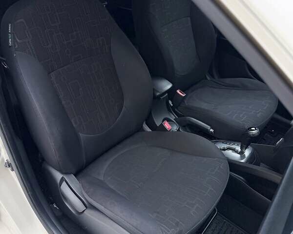 Бежевий Кіа Ріо, об'ємом двигуна 1.59 л та пробігом 122 тис. км за 8600 $, фото 24 на Automoto.ua