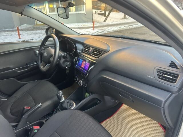 Бежевий Кіа Ріо, об'ємом двигуна 1.4 л та пробігом 187 тис. км за 5600 $, фото 8 на Automoto.ua