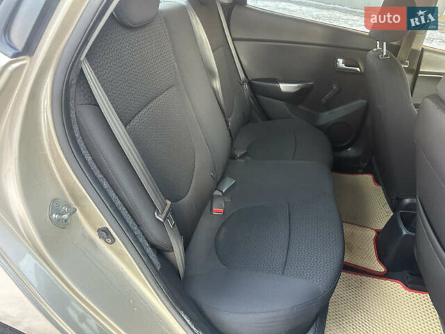 Бежевый Киа Рио, объемом двигателя 1.4 л и пробегом 187 тыс. км за 5600 $, фото 6 на Automoto.ua