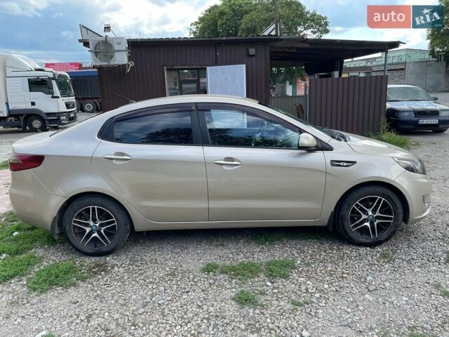 Бежевий Кіа Ріо, об'ємом двигуна 1.59 л та пробігом 180 тис. км за 7800 $, фото 5 на Automoto.ua