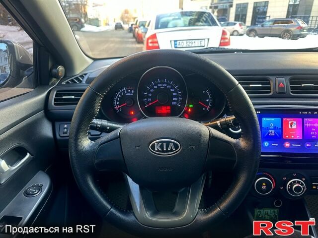 Бежевий Кіа Ріо, об'ємом двигуна 1.4 л та пробігом 18700 тис. км за 5600 $, фото 8 на Automoto.ua