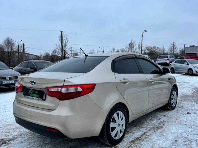 Бежевий Кіа Ріо, об'ємом двигуна 1.6 л та пробігом 162 тис. км за 5999 $, фото 1 на Automoto.ua