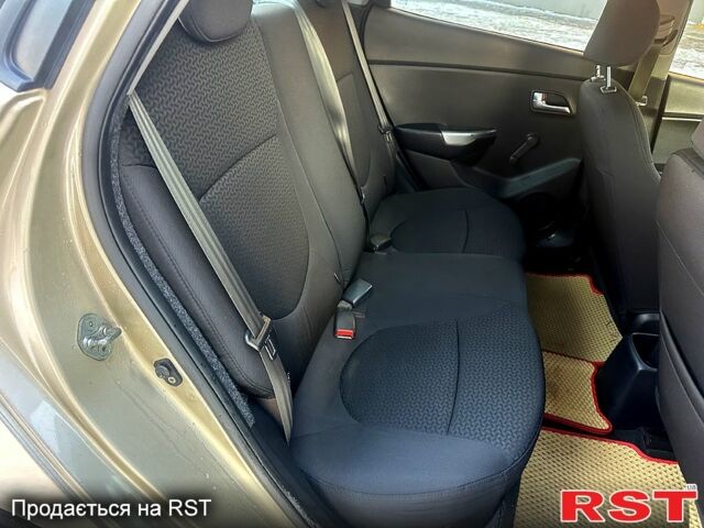 Бежевий Кіа Ріо, об'ємом двигуна 1.4 л та пробігом 18700 тис. км за 5600 $, фото 5 на Automoto.ua