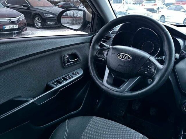 Бежевий Кіа Ріо, об'ємом двигуна 1.6 л та пробігом 162 тис. км за 5999 $, фото 12 на Automoto.ua
