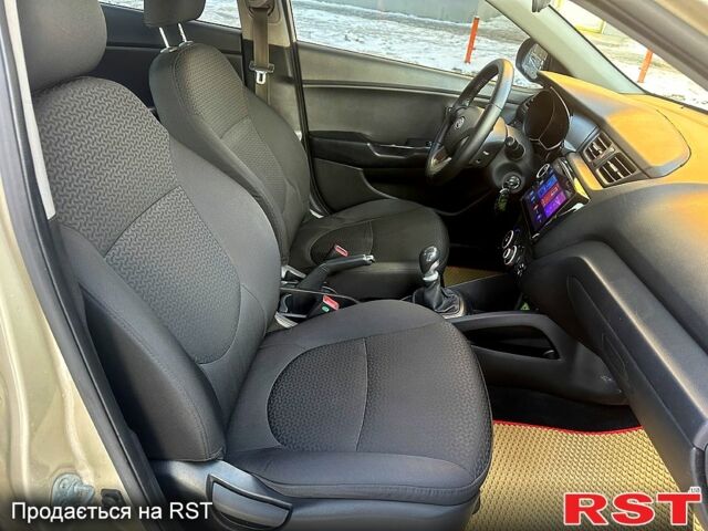 Бежевий Кіа Ріо, об'ємом двигуна 1.4 л та пробігом 18700 тис. км за 5600 $, фото 6 на Automoto.ua