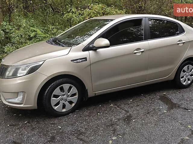 Бежевий Кіа Ріо, об'ємом двигуна 1.4 л та пробігом 187 тис. км за 6500 $, фото 2 на Automoto.ua