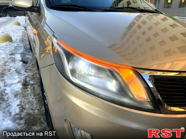 Бежевий Кіа Ріо, об'ємом двигуна 1.4 л та пробігом 18700 тис. км за 5600 $, фото 11 на Automoto.ua