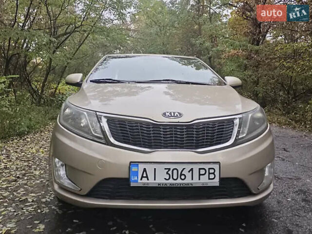 Бежевий Кіа Ріо, об'ємом двигуна 1.4 л та пробігом 187 тис. км за 6500 $, фото 1 на Automoto.ua