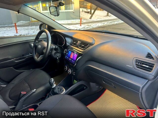 Бежевий Кіа Ріо, об'ємом двигуна 1.4 л та пробігом 18700 тис. км за 5600 $, фото 7 на Automoto.ua