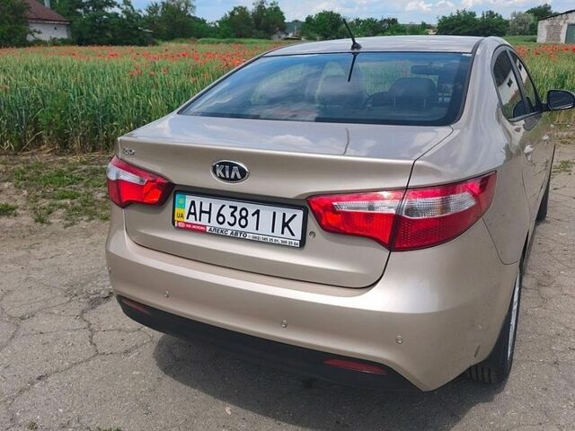 Бежевий Кіа Ріо, об'ємом двигуна 1.4 л та пробігом 13 тис. км за 10500 $, фото 6 на Automoto.ua