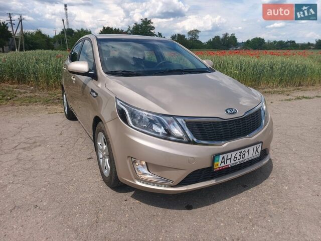 Бежевий Кіа Ріо, об'ємом двигуна 1.4 л та пробігом 13 тис. км за 10500 $, фото 4 на Automoto.ua