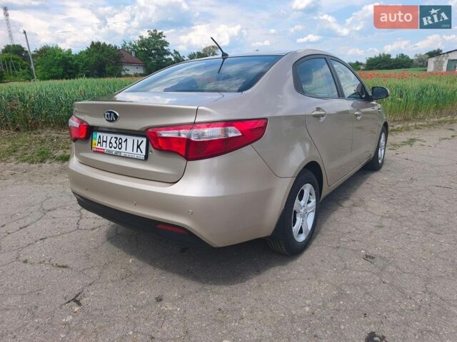 Бежевий Кіа Ріо, об'ємом двигуна 1.4 л та пробігом 13 тис. км за 10500 $, фото 5 на Automoto.ua