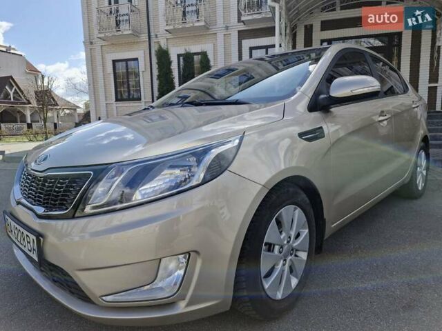 Бежевий Кіа Ріо, об'ємом двигуна 1.6 л та пробігом 134 тис. км за 9750 $, фото 13 на Automoto.ua
