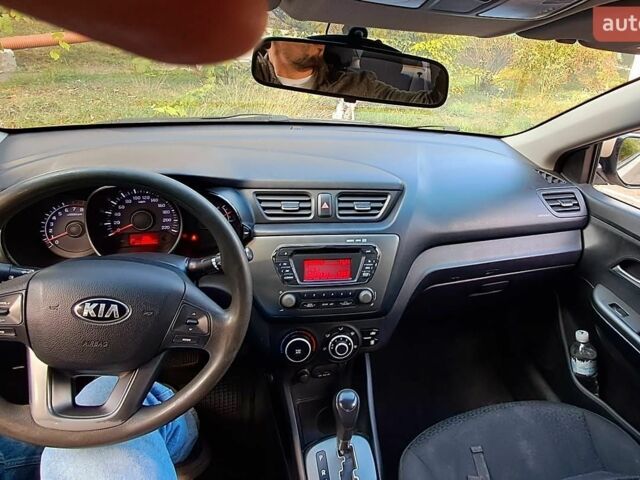 Бежевий Кіа Ріо, об'ємом двигуна 1.4 л та пробігом 109 тис. км за 7400 $, фото 6 на Automoto.ua