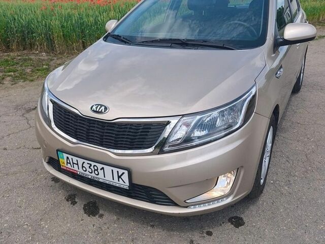 Бежевий Кіа Ріо, об'ємом двигуна 1.4 л та пробігом 13 тис. км за 10500 $, фото 2 на Automoto.ua