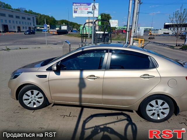 Бежевый Киа Рио, объемом двигателя 1.6 л и пробегом 295 тыс. км за 6700 $, фото 1 на Automoto.ua