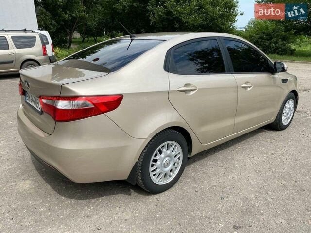 Бежевый Киа Рио, объемом двигателя 1.6 л и пробегом 146 тыс. км за 7600 $, фото 13 на Automoto.ua