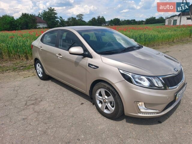 Бежевий Кіа Ріо, об'ємом двигуна 1.4 л та пробігом 13 тис. км за 10500 $, фото 3 на Automoto.ua