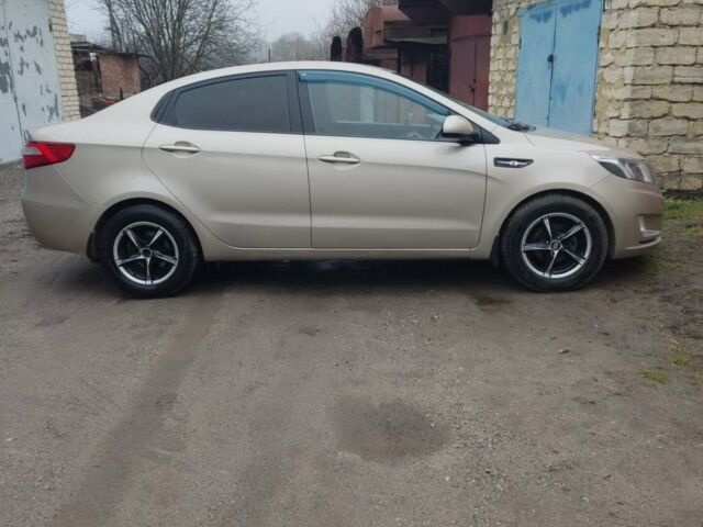 Бежевий Кіа Ріо, об'ємом двигуна 1.4 л та пробігом 169 тис. км за 6500 $, фото 5 на Automoto.ua