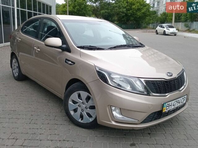 Бежевий Кіа Ріо, об'ємом двигуна 1.4 л та пробігом 160 тис. км за 8200 $, фото 1 на Automoto.ua