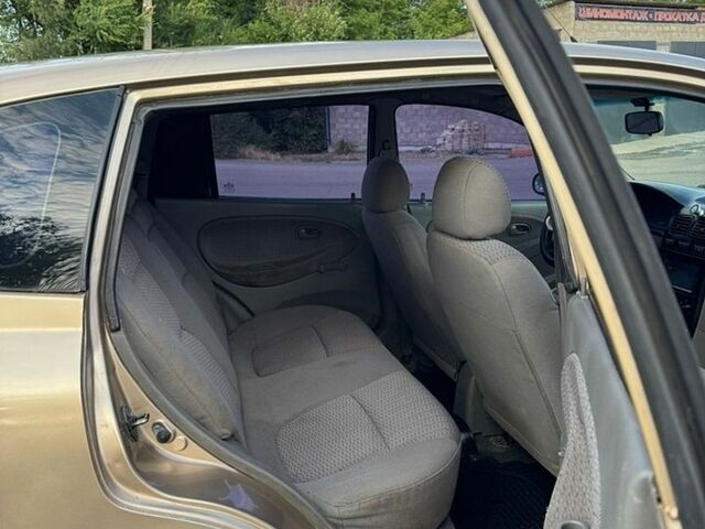 Бежевый Киа Рио, объемом двигателя 1.4 л и пробегом 229 тыс. км за 2450 $, фото 12 на Automoto.ua