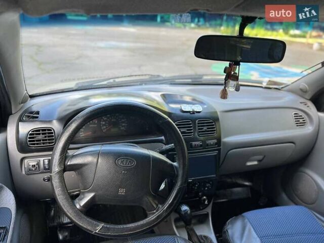 Бежевий Кіа Ріо, об'ємом двигуна 1.49 л та пробігом 252 тис. км за 1650 $, фото 11 на Automoto.ua