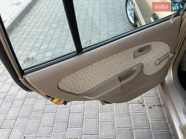 Бежевий Кіа Ріо, об'ємом двигуна 1.34 л та пробігом 134 тис. км за 3999 $, фото 70 на Automoto.ua