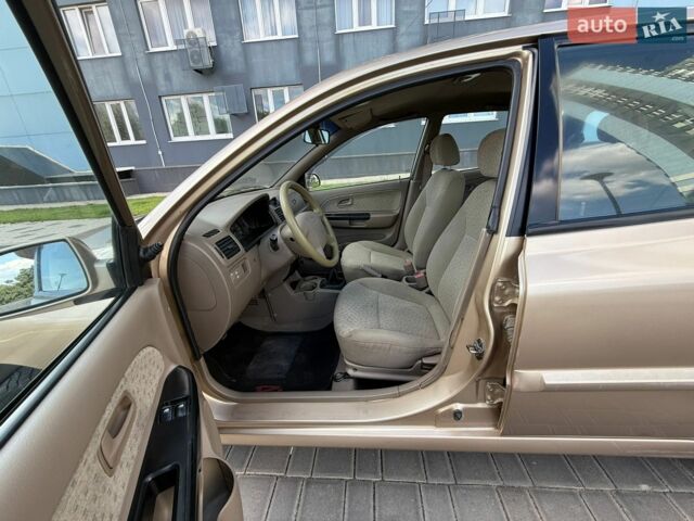 Бежевий Кіа Ріо, об'ємом двигуна 1.34 л та пробігом 134 тис. км за 3999 $, фото 42 на Automoto.ua