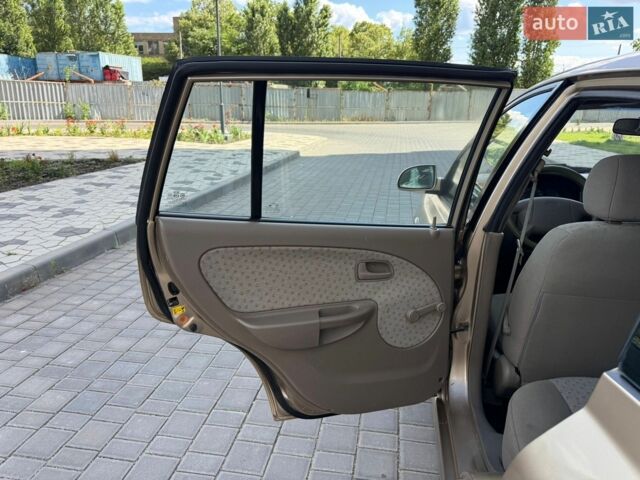 Бежевий Кіа Ріо, об'ємом двигуна 1.34 л та пробігом 134 тис. км за 3999 $, фото 68 на Automoto.ua
