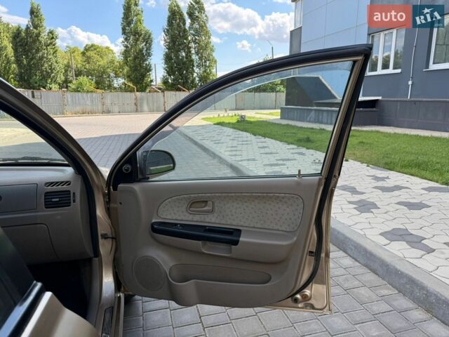 Бежевий Кіа Ріо, об'ємом двигуна 1.34 л та пробігом 134 тис. км за 3999 $, фото 50 на Automoto.ua